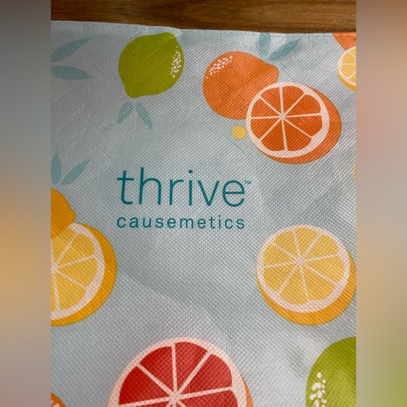Thrive Causemetics Blue Makeup Travel Case with Fruit Design - Picture 8 of 9